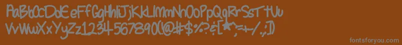Шрифт Seleneshandwriting1 – серые шрифты на коричневом фоне