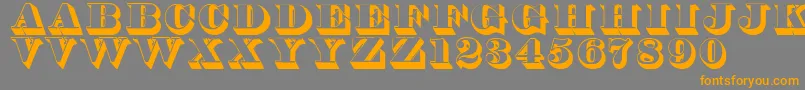 フォントThorneshaded – オレンジの文字は灰色の背景にあります。