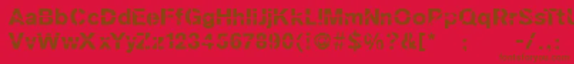 フォントSanskleincut – 赤い背景に茶色の文字