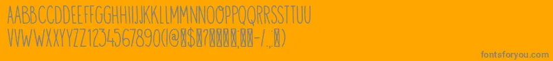 Visum-Schriftart – Graue Schriften auf orangefarbenem Hintergrund