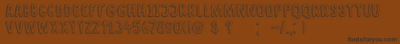 DkNanuk Font – Black Fonts on Brown Background