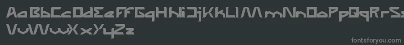 フォントTheWizardOfOneClick – 黒い背景に灰色の文字