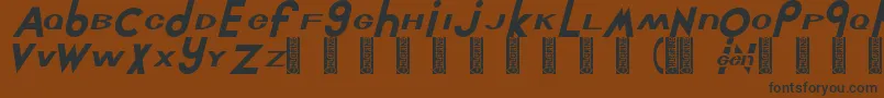フォントChlorint – 黒い文字が茶色の背景にあります