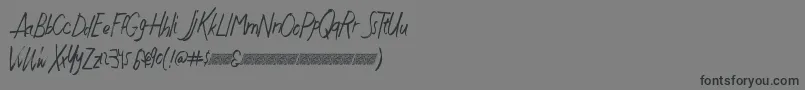 Justwritedt-Schriftart – Schwarze Schriften auf grauem Hintergrund