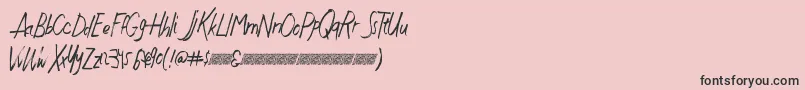フォントJustwritedt – ピンクの背景に黒い文字