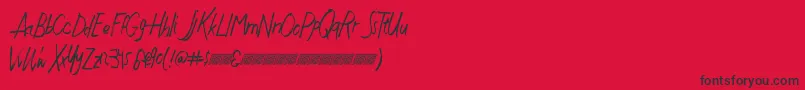 Justwritedt-Schriftart – Schwarze Schriften auf rotem Hintergrund