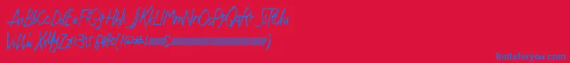 Justwritedt-Schriftart – Blaue Schriften auf rotem Hintergrund