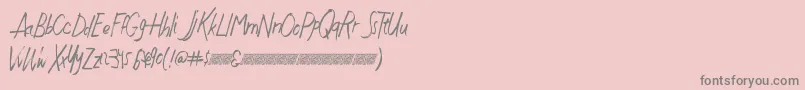 Czcionka Justwritedt – szare czcionki na różowym tle