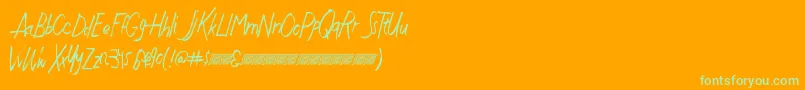 Czcionka Justwritedt – zielone czcionki na pomarańczowym tle