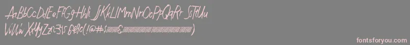 Justwritedt-Schriftart – Rosa Schriften auf grauem Hintergrund