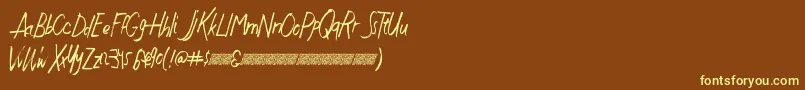 Justwritedt-fontti – keltaiset fontit ruskealla taustalla