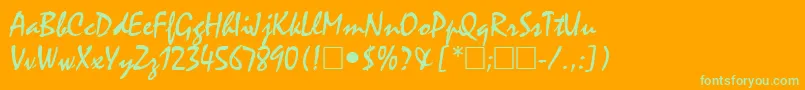 ManfredRegular-Schriftart – Grüne Schriften auf orangefarbenem Hintergrund