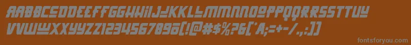 Hongkonghustlecondital-fontti – harmaat kirjasimet ruskealla taustalla