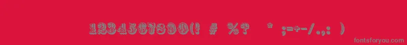 RococoInitial-Schriftart – Graue Schriften auf rotem Hintergrund