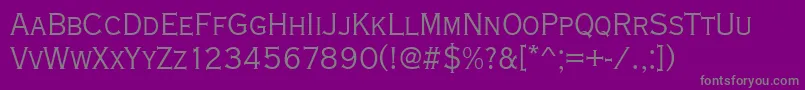 Copperplatetligcon-fontti – harmaat kirjasimet violetilla taustalla