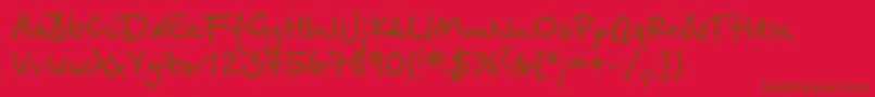 BetinascriptcBold Font – Brown Fonts on Red Background