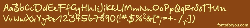 BetinascriptcBold Font – Yellow Fonts on Brown Background