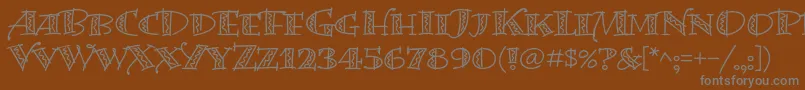 BermudalpstdSquiggle Font – Gray Fonts on Brown Background