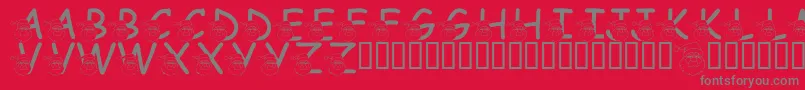 LmsSaintNick-Schriftart – Graue Schriften auf rotem Hintergrund
