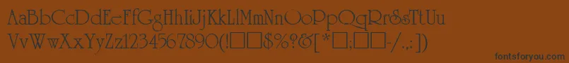 フォントUnicornUkrainian – 黒い文字が茶色の背景にあります