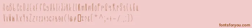 Cmonkeelight-Schriftart – Braune Schriften auf rosa Hintergrund