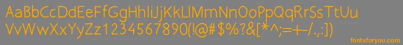 Freefontpro Font – Orange Fonts on Gray Background