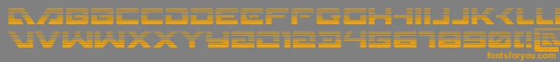 フォントWildcard31grad – オレンジの文字は灰色の背景にあります。