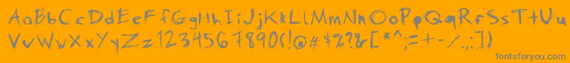 Danimal-fontti – harmaat kirjasimet oranssilla taustalla
