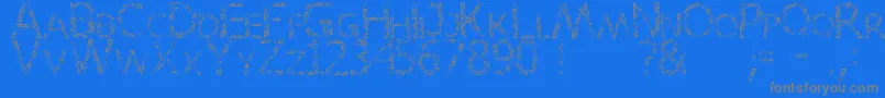 Karora-Schriftart – Graue Schriften auf blauem Hintergrund