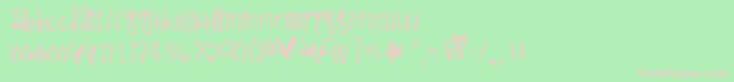Gammajays-fontti – vaaleanpunaiset fontit vihreällä taustalla