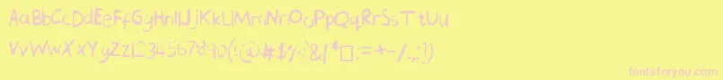 ChequeredPencilCrayons-Schriftart – Rosa Schriften auf gelbem Hintergrund