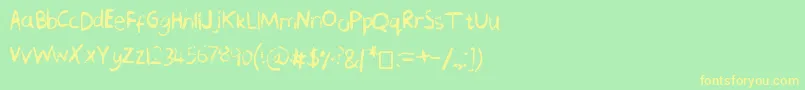 Fonte ChequeredPencilCrayons – fontes amarelas em um fundo verde