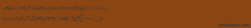 Amanda-fontti – mustat fontit ruskealla taustalla