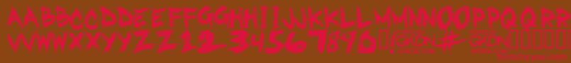 GwizskRegular-Schriftart – Rote Schriften auf braunem Hintergrund