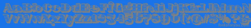 フォントFatFlamingo5WoodcutBlack – 青い背景に灰色の文字