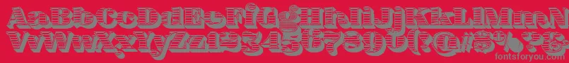 FatFlamingo5WoodcutBlack-Schriftart – Graue Schriften auf rotem Hintergrund