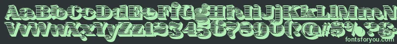 フォントFatFlamingo5WoodcutBlack – 黒い背景に緑の文字