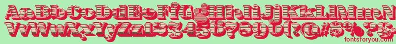 FatFlamingo5WoodcutBlack-Schriftart – Rote Schriften auf grünem Hintergrund