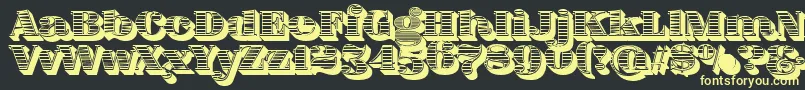 フォントFatFlamingo5WoodcutBlack – 黒い背景に黄色の文字