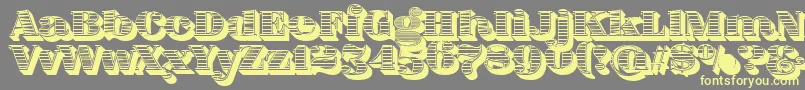 フォントFatFlamingo5WoodcutBlack – 黄色のフォント、灰色の背景