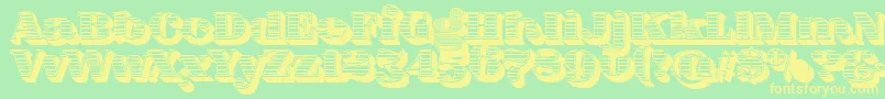 FatFlamingo5WoodcutBlack-Schriftart – Gelbe Schriften auf grünem Hintergrund