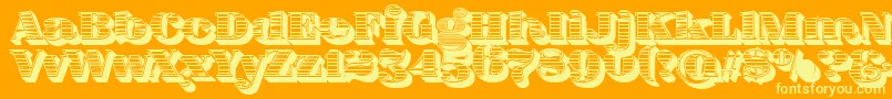 Шрифт FatFlamingo5WoodcutBlack – жёлтые шрифты на оранжевом фоне