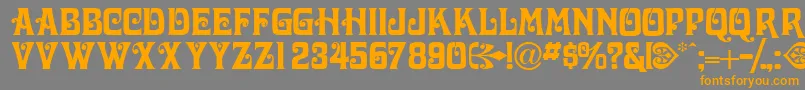 Volutecapsssk Font – Orange Fonts on Gray Background