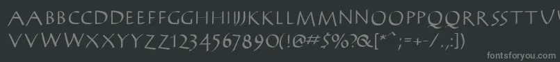 AntikwaBold-fontti – harmaat kirjasimet mustalla taustalla