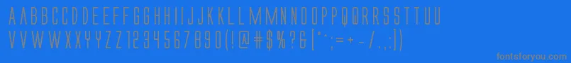 フォントAlienleaguebold – 青い背景に灰色の文字