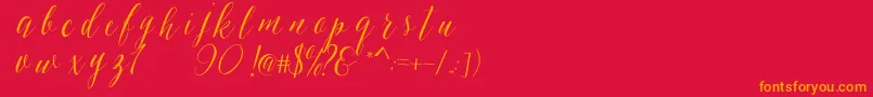 フォントSheilovaScript – 赤い背景にオレンジの文字