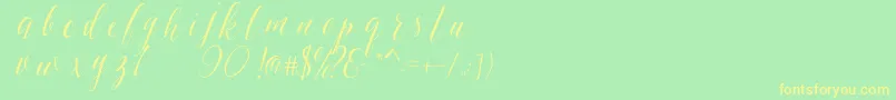 SheilovaScript Font – Yellow Fonts on Green Background