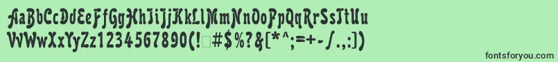 フォントKarollaatt – 緑の背景に黒い文字