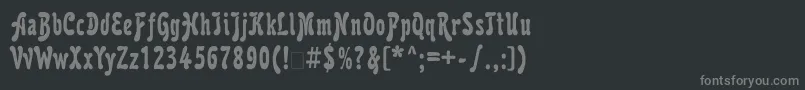 フォントKarollaatt – 黒い背景に灰色の文字