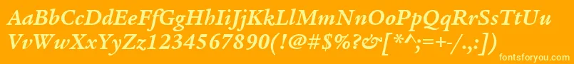 ItcLegacySerifLtBoldItalic-Schriftart – Gelbe Schriften auf orangefarbenem Hintergrund